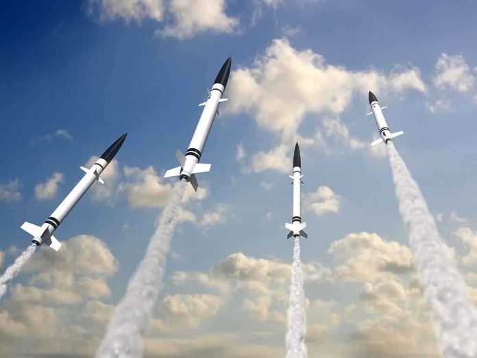 shutterstock_14964970.jpg Multiple missiles launching into a cloudy sky