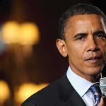 Obamas TOP Chief ARRESTED – Faces Federal Charges! Individual speaking into a microphone at an event