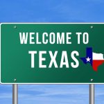 Trump Dismisses Crockett: A “Dream Opponent” Welcome to Texas road sign with a Texas map