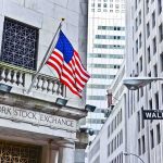 Stock Disclosure Scandal Rocks Progressive Congresswoman Facade of the New York Stock Exchange with an American flag and Wall Street sign