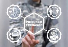 Person pressing Prisoner Exchange button on virtual interface