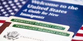 Permanent resident cards with welcome guide and flag.
