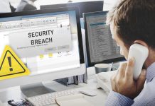 Security breach alert displayed on computer monitor.