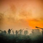 World War Looms? Tucker Carlson’s Alarming Claims Soldiers and tanks in the foggy battlefield.