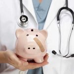 FBI Uncovers Ohio Doctor’s Fraudulent Empire A doctor in a white coat holding a piggy bank with a bandage on it