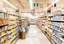 A grocery store aisle filled with various food products on shelves