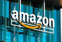 Amazon Ring: Super Bowl Ad KILLS Police Deal Amazon logo on a glass building facade.