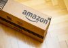 Amazon Drone Crash Sparks Safety Panic Amazon package on wooden floor.