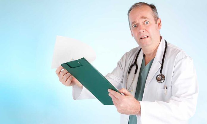 A doctor in a white coat looking surprised while holding a clipboard