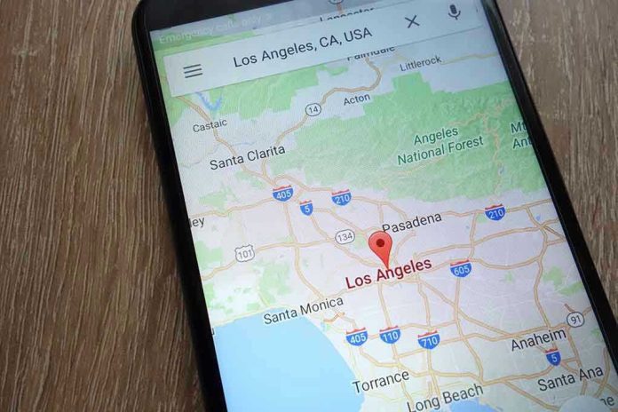 1114605992 Smartphone displaying map of Los Angeles, California.