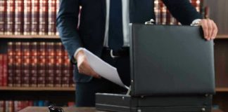 Actor’s Brutal Stabbing Conviction Reveals System Flaws Gavel, lawyer, briefcase, and legal books on the table.
