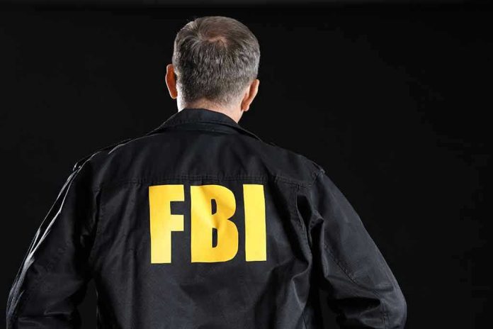 2473870221 FBI agent with back facing the camera.
