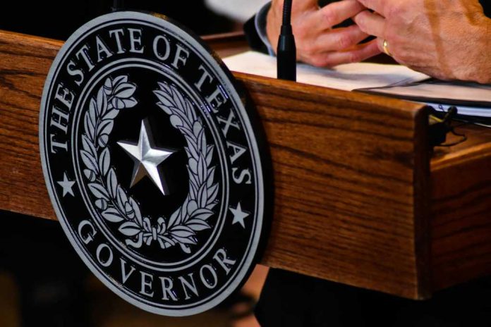 shutterstock1128379292jpg Close-up of the Texas governors seal on a wooden podium with hands gesturing in the background