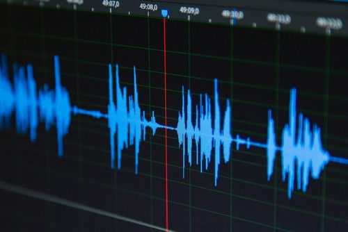 shutterstock2195793797jpg-1 Audio waveform on a digital editing screen