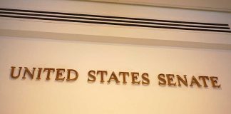 Senate Drops $70B Bombshell Sign displaying United States Senate in a government building