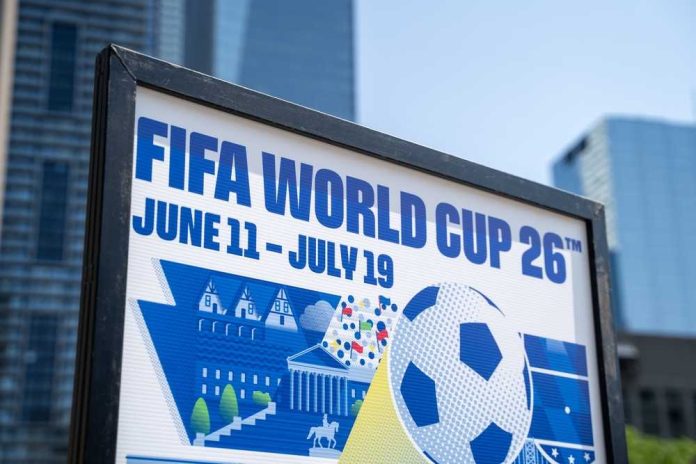 shutterstock_2640423397 FIFA World Cup 26 poster with soccer ball in urban setting