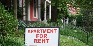 Housing Shock: Biden Border Wave Blamed Sign indicating an apartment is available for rent