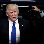 Trump Slams Brakes On NYC Arrest Fantasy man in suit stepping out of a vehicle
