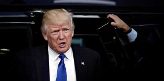 Trump Slams Brakes On NYC Arrest Fantasy man in suit stepping out of a vehicle