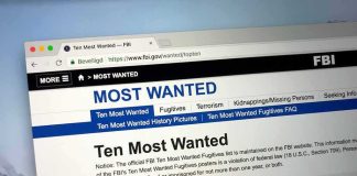 Computer screen showing an FBI Most Wanted webpage