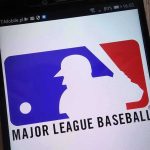 Major League Baseball logo on a smartphone screen