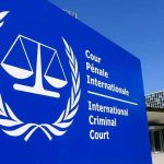 Arrest Drama Engulfs Netanyahu’s UN Trip International Criminal Court sign with scales emblem outside modern building