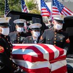 American Deaths, TRUMP Vows Payback U.S. Marines carry a flag-draped casket into a hearse