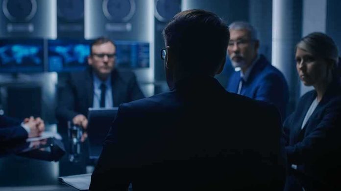 Business team in a dim conference room