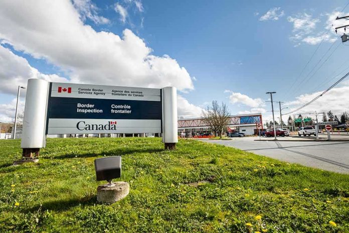 shutterstock_1689376294 Canada border inspection sign at roadside checkpoint