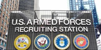Military Recruiter’s $266K Fraud Play U.S. Armed Forces recruiting station facade with service emblems