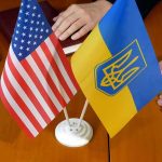 Ambassador Yanked Amid Corruption Whispers U.S. and Ukrainian flags on a table
