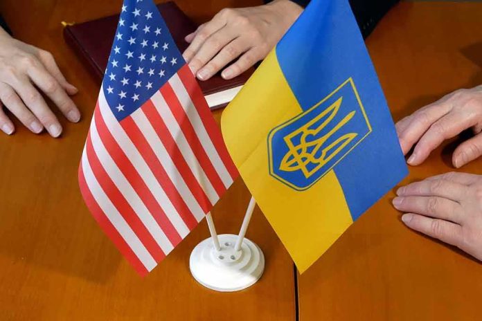 shutterstock_2034604337 U.S. and Ukrainian flags on a table