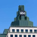 Court Showdown: ABC Claims Government Pressure abc logo atop green-stepped building against clear blue sky