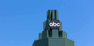 Court Showdown: ABC Claims Government Pressure abc logo atop green-stepped building against clear blue sky