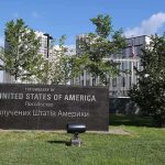 U.S. embassy sign in landscaped grounds