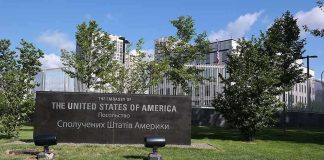 Catastrophic Clash Warning—Rubio’s Risky China Bet U.S. embassy sign in landscaped grounds