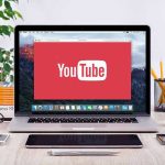 Trump Sons Cash In — Pentagon Payouts Soar YouTube logo on a laptop screen on desk.