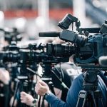 Trump’s Camp David Move Could Rewrite Iran Talks Broadcast cameras on tripods at a press event
