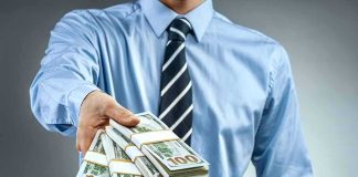 Paid To Quit? Washington’s $9.5B Stunner Person in business attire offering bundles of US dollar bills