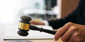 Narco Plot Or State Duty? Court On Edge Judge's hand holding a gavel over a sound block
