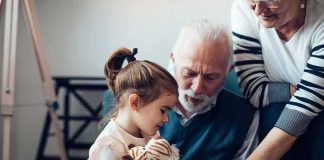 Doc Euthanizes 2-Year-Old, Cleared by Court Little girl holding a stuffed tiger with two older adults nearby