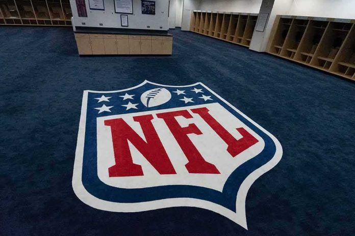 shutterstock_1163596087 NFL logo on the floor of an empty locker room