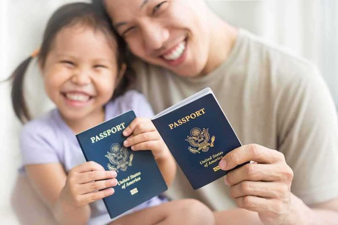 Smiling child and adult holding passports