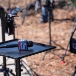 Microphone on a small stand-up table at an outdoor media setup