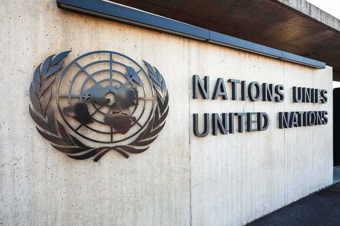 United Nations emblem and signage on a concrete wall