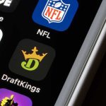 WNBA Star Torches Sweeney Backlash Smartphone screen showing NFL and DraftKings app icons