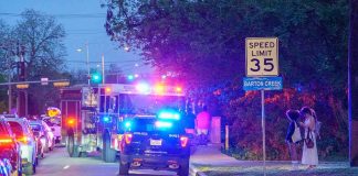 News Chopper Plummets During Crash Coverage Emergency vehicles with flashing lights on a city street at night