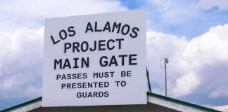 Los Alamos Project main gate sign on a guard post