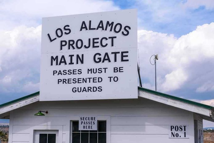 shutterstock_2061743624 Los Alamos Project main gate sign on a guard post