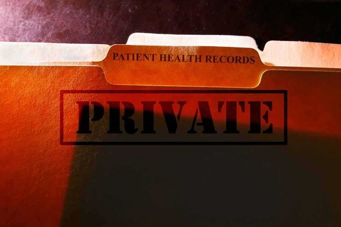shutterstock_241241680 file folders labeled for patient health records marked private